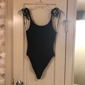 Ribbed black bodysuit with tie straps
